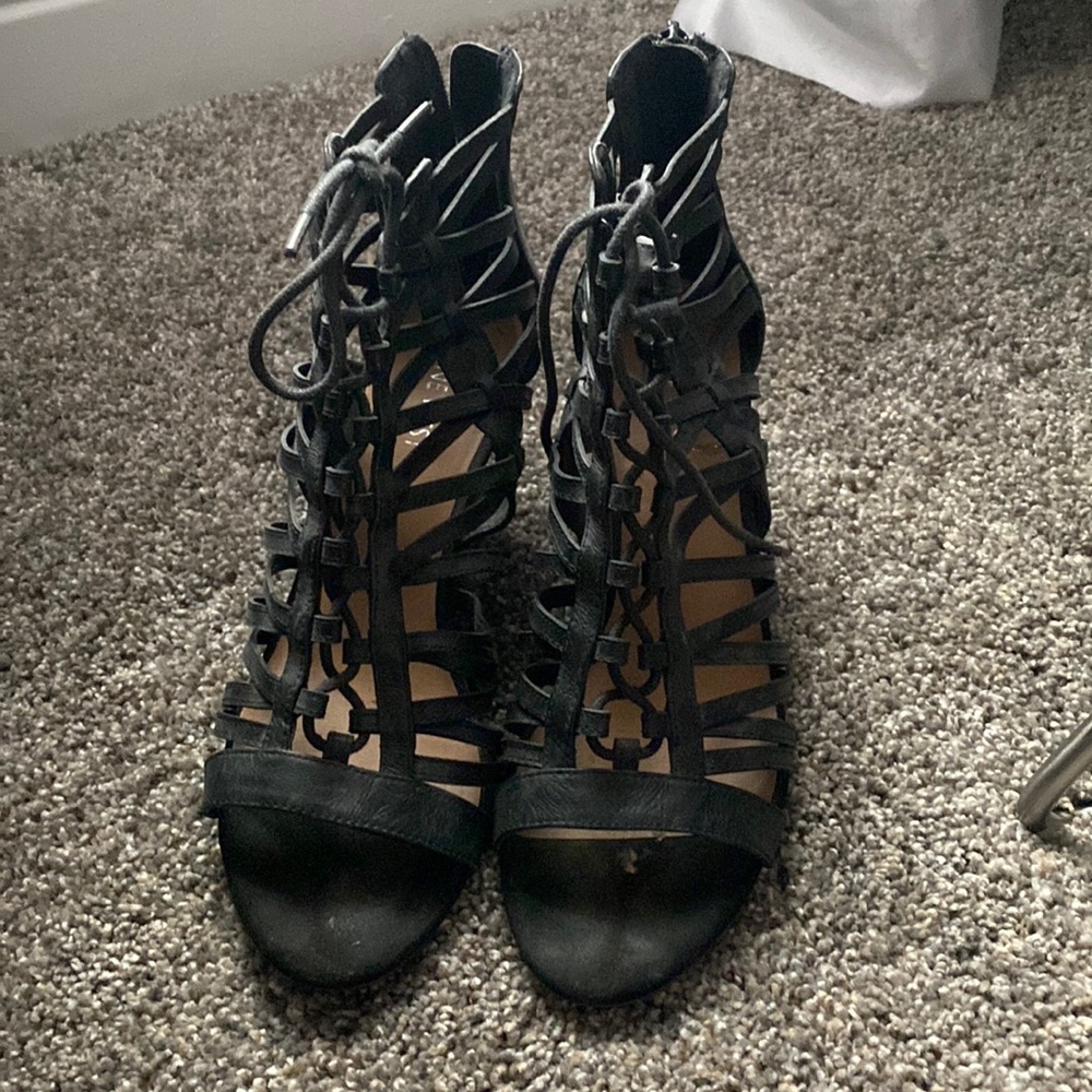 None west. Wedged heels. Size 7.5